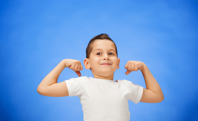 Kid Showing His Muscles